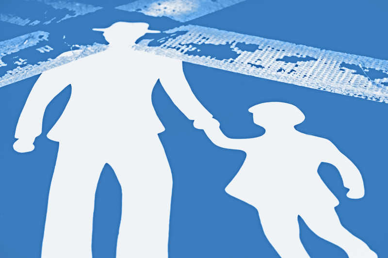 有父亲和孩子的交通标志